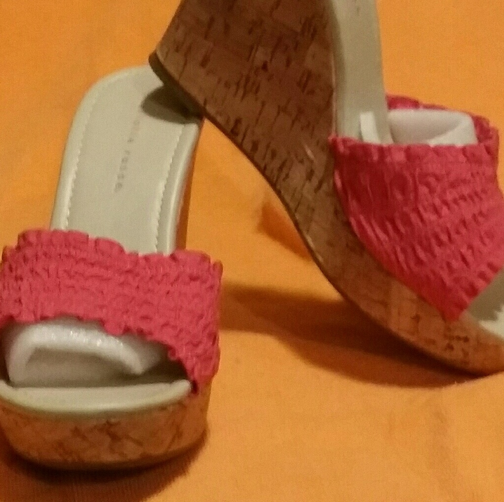 A pair of wedged sandals